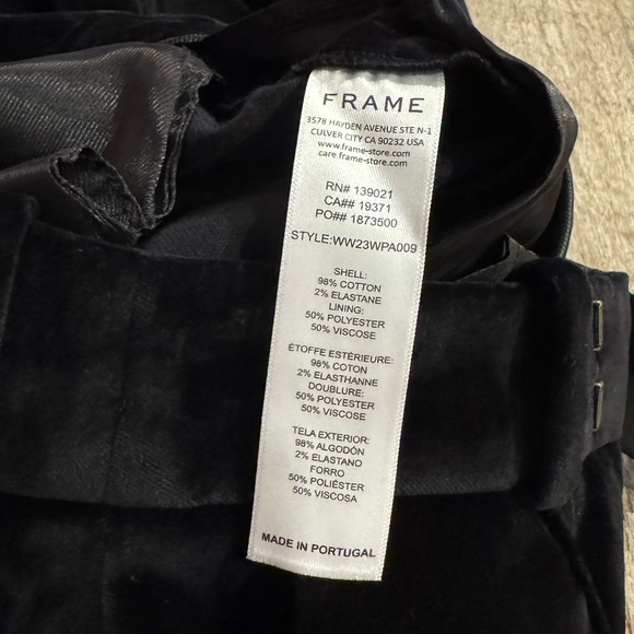 FRAME Slim Stacked Velvet Trousers in Black. - Picture 10 of 10